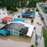 Emergency responders working in flooded area after severe storm damage