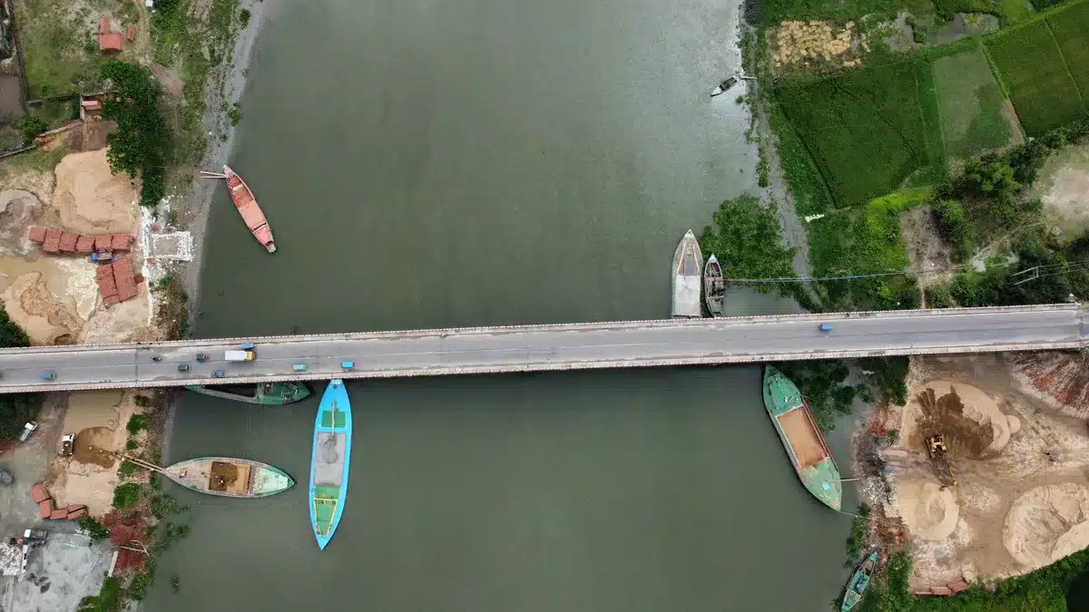 Satellite image showing the completed North Korean side of the bridge with customs facilities visible