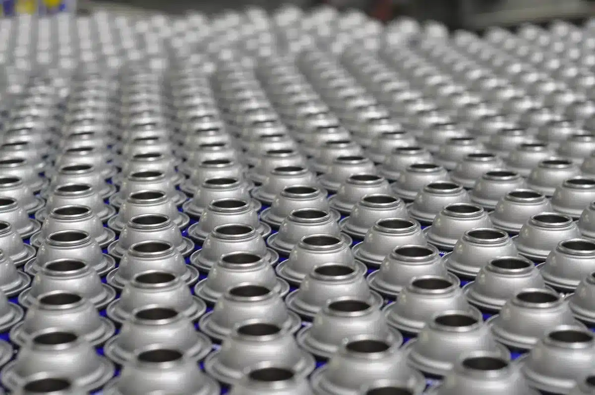 Assembly line with missile components and technicians in a factory