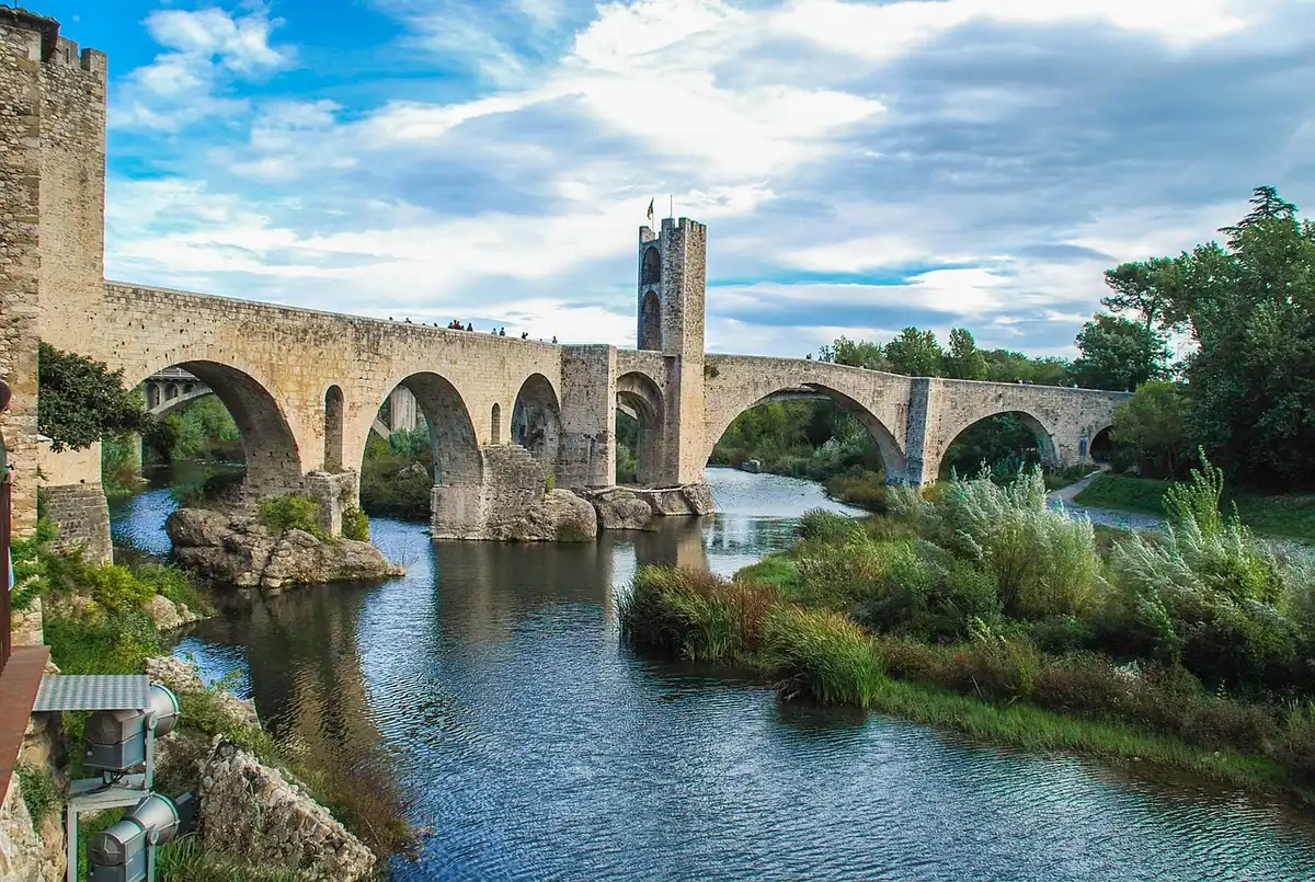 Ancient stone bridge architecture with arches spanning across water